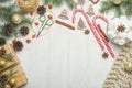Christmas frame with gingerbread cookies, Christmas tree, pine cones, toys. Copy space for text. Autumn winter holidays Royalty Free Stock Photo