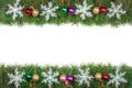 Christmas frame made of fir branches decorated with colored balls and snowflakes isolated on white background Royalty Free Stock Photo