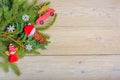 Christmas frame made of fir branches, red berries. Christmas wallpaper. Flat lay, top view, copy space Royalty Free Stock Photo