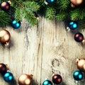 Christmas frame with multicolor baubles and fir branches Royalty Free Stock Photo