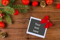 Christmas frame for photo or text on a wooden table. Royalty Free Stock Photo