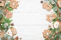 Christmas frame with rustic ornaments and Gingerbread cookies on