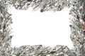Christmas frame with silvery tinsel Royalty Free Stock Photo