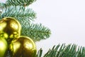 Christmas frame of spruce and Christmas decorations on a white background Royalty Free Stock Photo