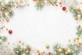 Christmas frame of spruce, red & gold christmas decorations on w Royalty Free Stock Photo