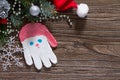 Christmas frame. Christmas tree branches and Christmas toys Father Christmas made of salt dough Royalty Free Stock Photo