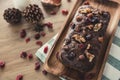 A christmas fruit cake on a wooden plate Royalty Free Stock Photo