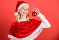 Christmas fun. Enjoy celebration happy new year. Girl happy wear santa costume celebrate christmas hold ball decor red Royalty Free Stock Photo