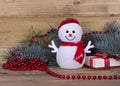 Christmas funny decorative snowmen on wooden board