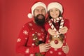 Christmas games. Share joy and happiness. Christmas Carol. Father and daughter with candy canes christmas decorations Royalty Free Stock Photo