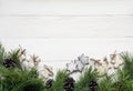 Christmas garland, Decoration, fir tree and sugar-glaze cookies on white wooden background. Top view, copy space Royalty Free Stock Photo