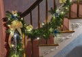 Christmas garland draped over bannister Royalty Free Stock Photo