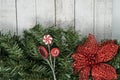 Christmas garland and glittery elements over a whitewashed wood background. Plenty of copyspace for textmessage, useful for Royalty Free Stock Photo