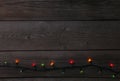 Christmas garland lights on grey background, copy space Royalty Free Stock Photo