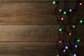 Christmas garland lights on grey background, copy space Royalty Free Stock Photo