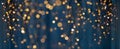 Christmas garland lights over dark blue background Royalty Free Stock Photo