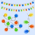 Christmas garland. Set of glowing garland of different colored bulbs of different shapes on blue background Royalty Free Stock Photo