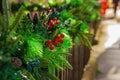 Christmas garland on the street close-up, outdoors festive decor