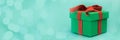 Christmas gift banner, holiday present, green box with red ribbon