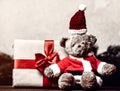 Christmas gift with bowknot and teddy bear toy