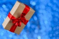 Christmas Gift Box Against Blink Bokeh Background Royalty Free Stock Photo