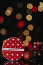 Christmas gift box,balls against bokeh backdrop Royalty Free Stock Photo