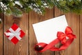 Christmas gift box and blank greeting card Royalty Free Stock Photo