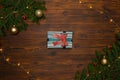 Christmas gift box on a dark wooden background