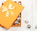 Christmas gift box filled with silver baubles Royalty Free Stock Photo