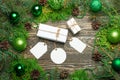 Christmas gift box. Christmas gifts in white boxes on a wooden table. flat lay lying with copy space. Royalty Free Stock Photo