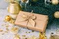 Christmas gift box with gold decorations. Royalty Free Stock Photo