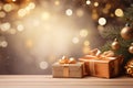 Christmas gift box with gold ribbon bow and golden Christmas ball decoration on wooden table. Merry Christmas present with bokeh Royalty Free Stock Photo