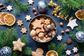 Christmas gift box with homemade gingerbread cookies, nuts and chocolates