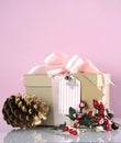 Christmas gift box in modern trend natural gift wrapping - vertical with copy space.