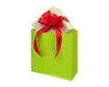 Christmas gift box red ribbon in a shopping bag isolated, white Royalty Free Stock Photo