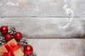 Christmas gift box with red ribbons on the snow background Royalty Free Stock Photo