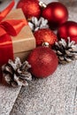 Christmas gift box with red ribbons on the snow background. Selective focus. Royalty Free Stock Photo