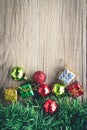 Christmas gift boxes and balls background on wooden texture Royalty Free Stock Photo