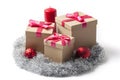 Christmas Gift Boxes and a Candle Royalty Free Stock Photo