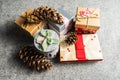 Christmas gift boxes on dark grey blanket background. Merry christmas greeting cards. Winter xmas holiday theme. Happy New Year