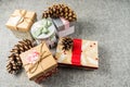 Christmas gift boxes on dark grey blanket background. Merry christmas greeting cards. Winter xmas holiday theme. Happy New Year