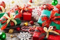 Christmas gift boxes with holiday decorations on wooden background Royalty Free Stock Photo