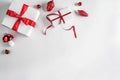 Christmas gift boxes with red ribbon and decoration on white background. Xmas and Happy New Year theme, snow Royalty Free Stock Photo