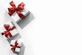 Christmas gift boxes with red ribbon and decoration on white background with bokeh, light. Xmas and Happy New Year holiday Royalty Free Stock Photo