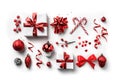 Christmas gift boxes with red ribbon, sparkles, confetti and decoration on white background. Xmas and Happy New Year holiday Royalty Free Stock Photo