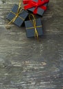 Christmas gift boxes on a rustic wooden background Royalty Free Stock Photo