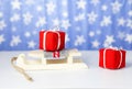 Christmas gift boxes on santa claus sleigh, on blue background Royalty Free Stock Photo