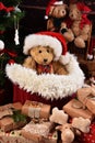 Christmas gift boxes and teddy bears in Santa hat Royalty Free Stock Photo