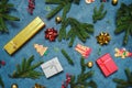 Christmas gift boxes, tree twigs and Christmas decorations. Christmas background. Royalty Free Stock Photo