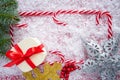 Christmas candy cane frame on snow Royalty Free Stock Photo